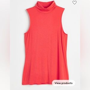 Coral sleeveless turtleneck